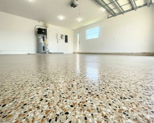 Flake epoxy garage floor after installation in Brevard County
