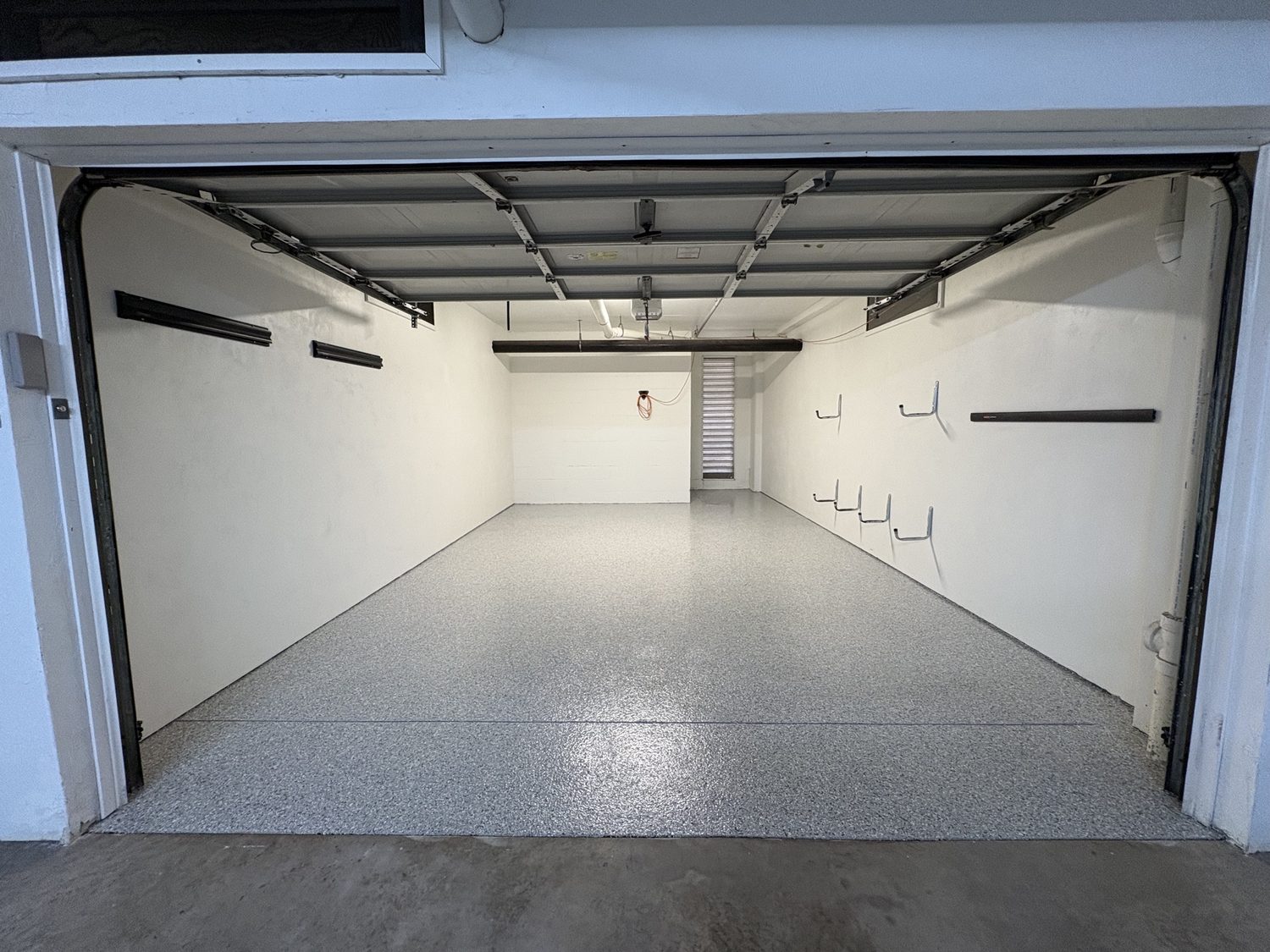 Garage Epoxy Flooring Vero Beach Fl Treasure Coast in Vero Beach, FL — before & after transformation by DJ Epoxy Solutions